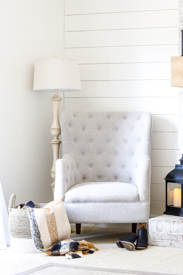 shiplap wall painted sherwin williams alabaster and white wingback arm chair