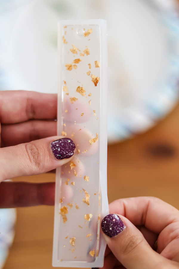 removing resin bookmark from mold