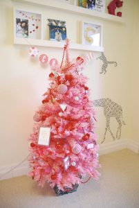 mini pink christmas tree decorated for Valentine's Day