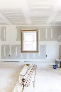 unpainted drywall with window in investment property flip house