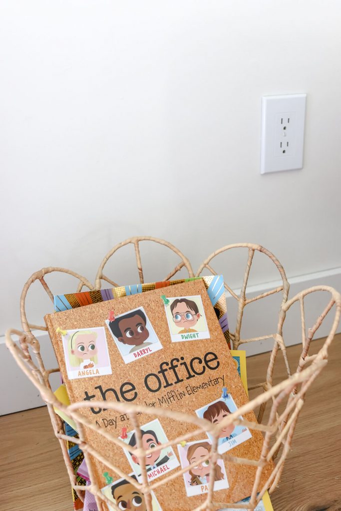 woven basket with children's books in it with The Office Elementary school book on top