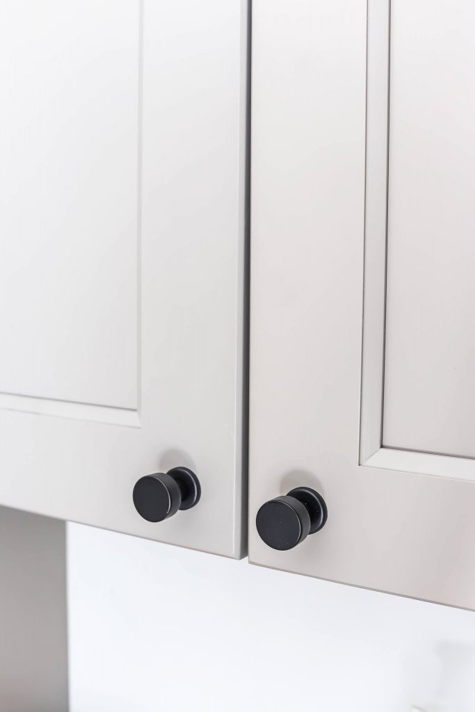 closeup of Emtek matte black cabinet hardware knob