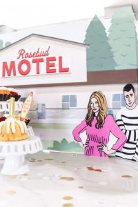 Alexis and David Rose backdrop for Schitt's Creek first birthday party