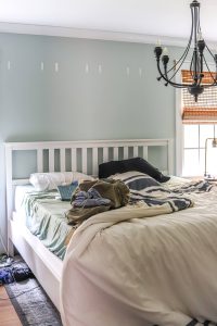 unmade bed and white ikea hemnes bed