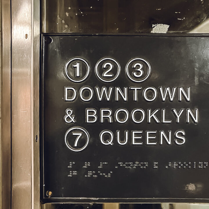 subway sign to Downtown and Brooklyn Queens New York