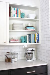 small open bookshelves in the kitchen