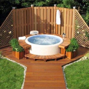 white inflatable hot tub on rounded deck