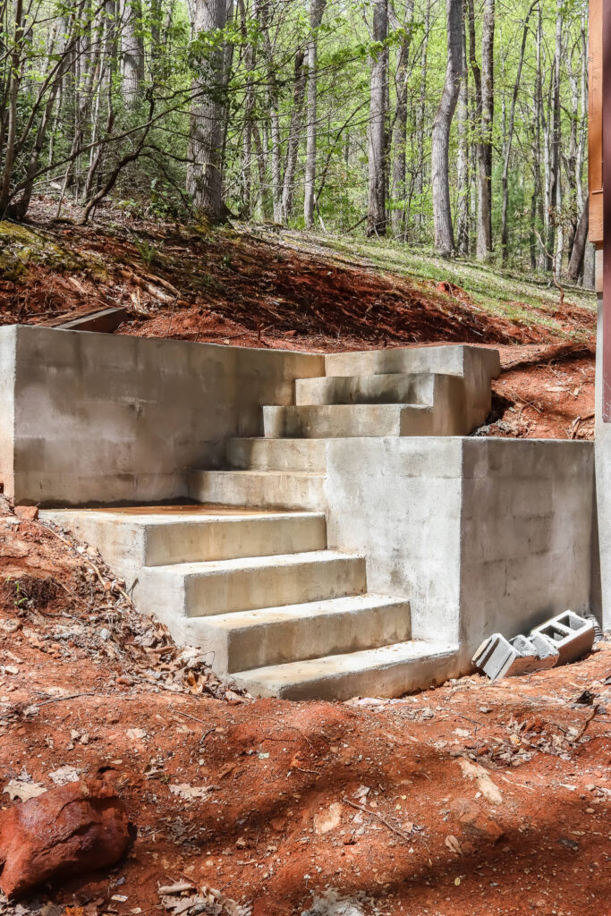 shot of concrete steps in mud