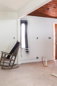 rocking chair in unfinished room