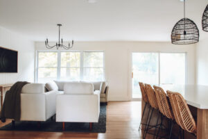 rattan bar stools and interior living room of small ranch style home