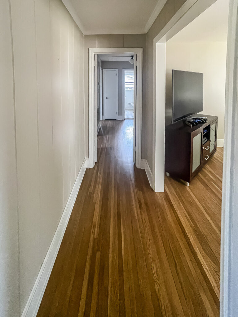 hallway with medium brown floors