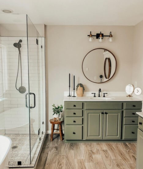bathroom with glass shower and vanity painted SW rosemary