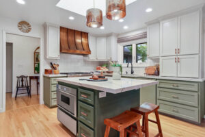 kitchen with sage green cabinets and island painted sherwin williams rosemary
